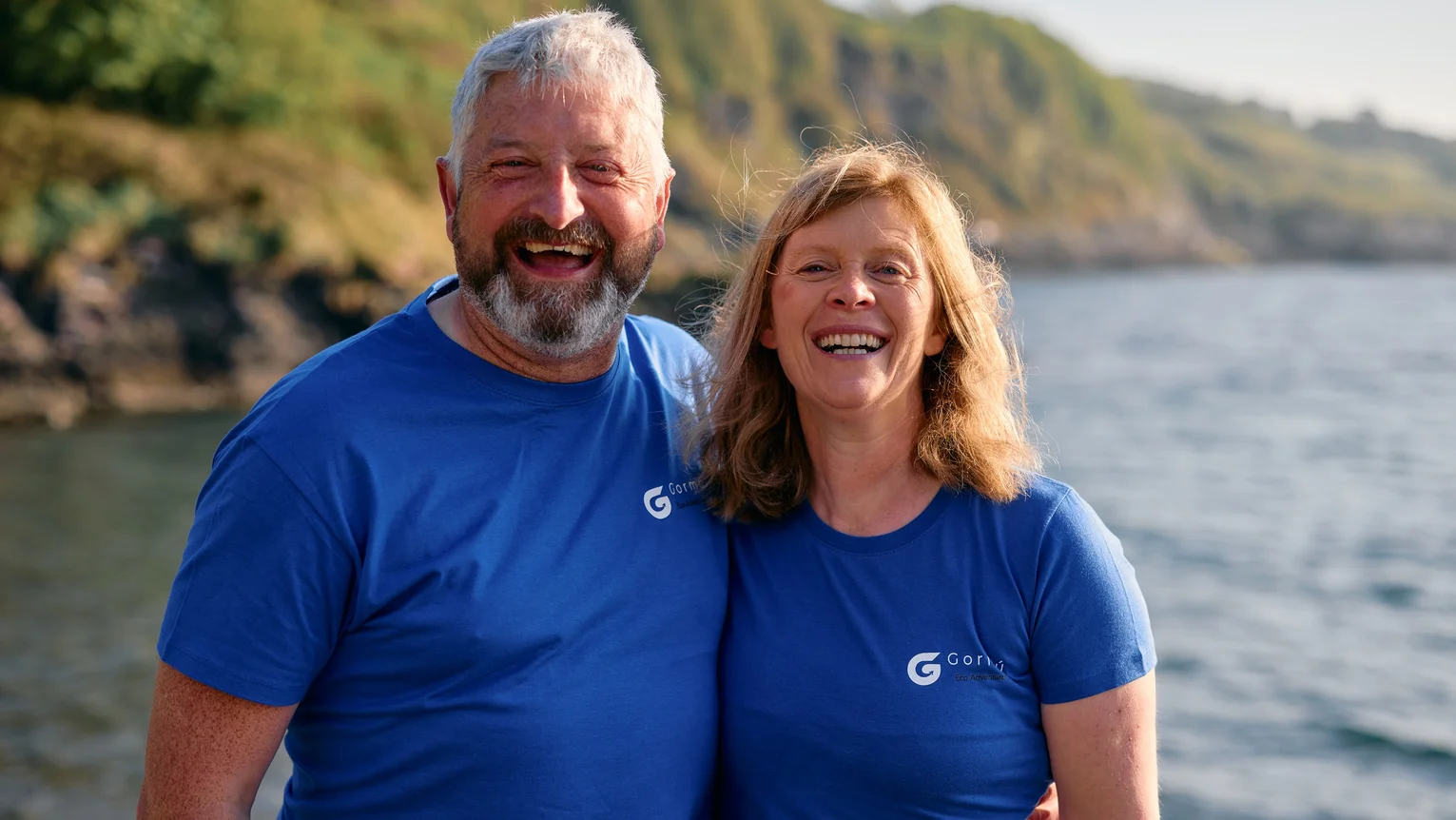A man and woman in blue shirts