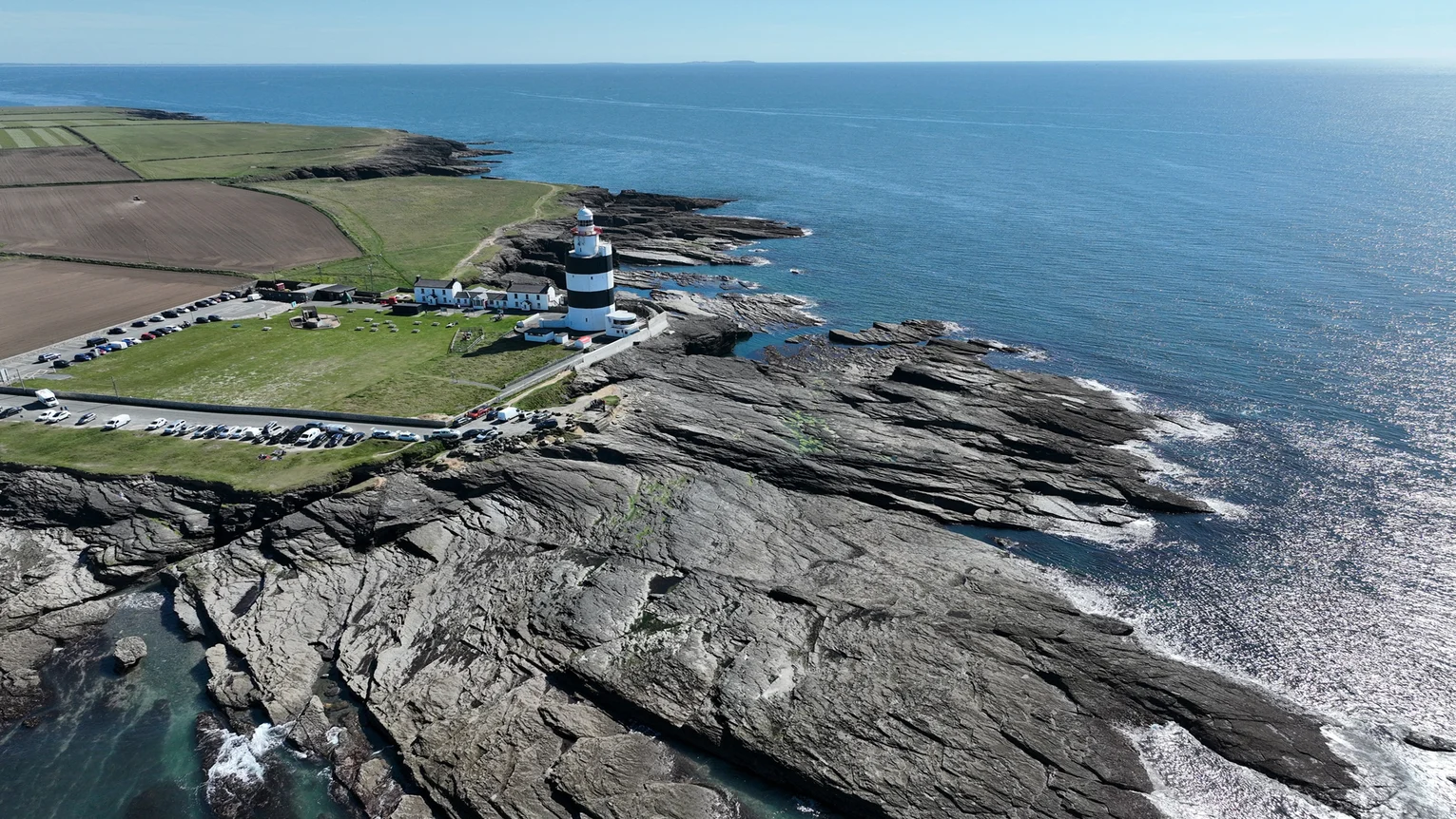 A lighthouse on a rocky shore