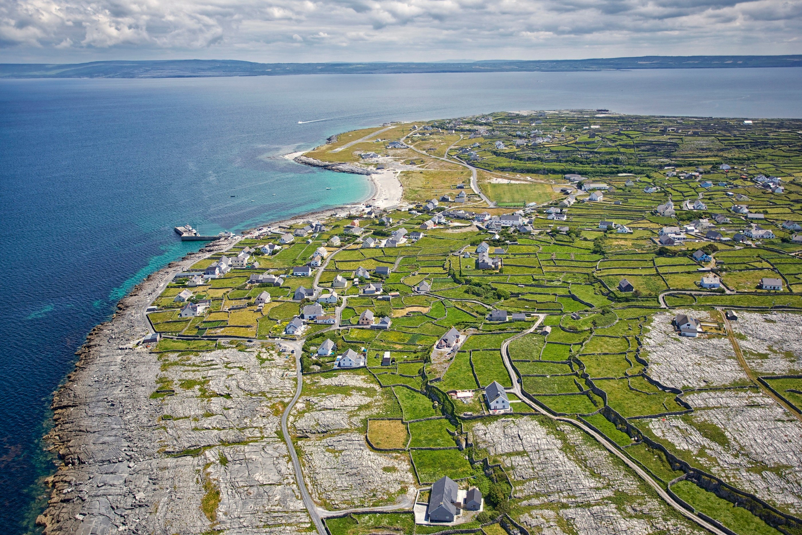 A aerial view of a small town on the aran islands