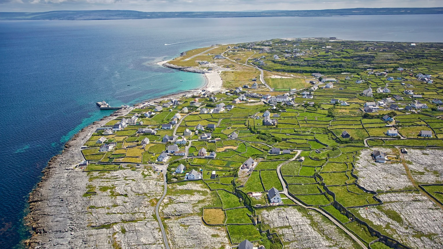 A aerial view of a small town on the aran islands