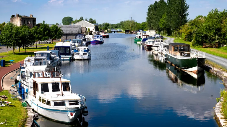A group of boats in a canal